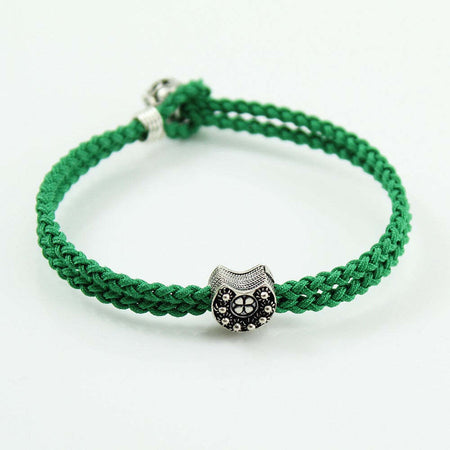 Bracciale sagola verde uomo centrale ferro di cavallo con Sardegna e bottone argento