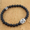 Bracciale elastico con sfere in onice e maschera della sartiglia in argento