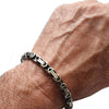 Bracciale uomo a filo quadro in argento 925