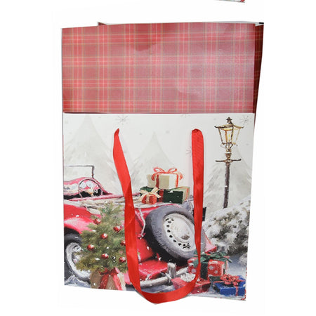 Busta per pacco regalo con decorazioni natalizie e manici in nylon h 34 cm