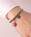 BYSIMON----Bracciale-in-Metallo-con-campanella-fucsia,-con-scritta-Capri-e-cristalli-bianchi