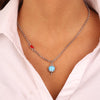 BYSIMON---Collana-in-Metallo-con-cuore-rosso-e-campanella-portafortuna-pendente-con-smalto-azzurro,-impreziosita-da-punto-luce