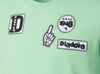 T-shirt Diadora Bambino Verde-Bianco con Logo - Collezione PE2026