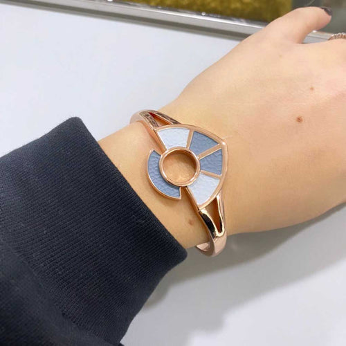 Bracciale Orbital Atena Alexarte artigianale, design intrecciato con cristalli e placcature, confezione di lusso