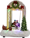 Carillon bimbi su altalena per villaggio di Babbo Natale con luci e animazioni. Casa e cucina/Decorazioni per interni/Addobbi e decorazioni per ricorrenze/Decorazioni natalizie/Oggettistica MagiediNatale.it - Altamura, Commerciovirtuoso.it