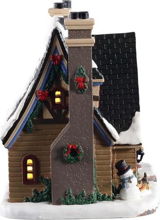 Casa natalizia con tetto innevato e finestre illuminate per villaggio di Natale Casa e cucina/Decorazioni per interni/Addobbi e decorazioni per ricorrenze/Decorazioni natalizie/Oggettistica MagiediNatale.it - Altamura, Commerciovirtuoso.it