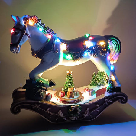 Statuetta cavallo a dondolo con movimento, luci e musica per decorazioni natalizie