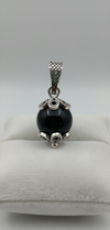 Ciondolo Su Coccu argento con onice nero portafortuna Sardegna