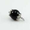 Ciondolo Su Coccu argento rodiato con onice nero portafortuna Sardegna