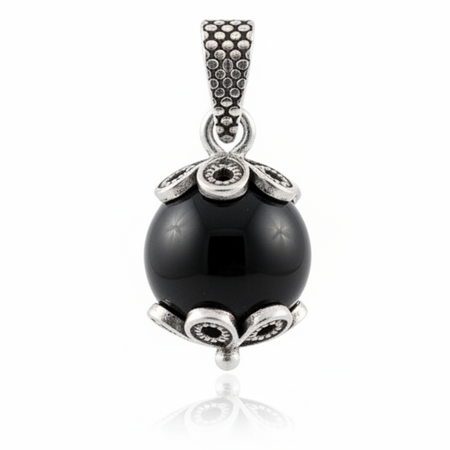 Ciondolo Su Coccu argento brunito con onice nero portafortuna Sardegna