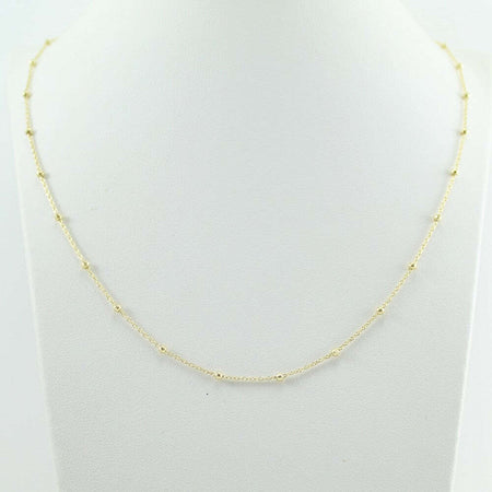 Collana girocollo donna in oro giallo con sfere lucide sfaccettate intercalari