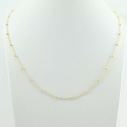 Collana girocollo donna in oro giallo con sfere lucide sfaccettate intercalari