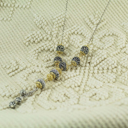 Collana lunga da donna in argento sfere filigrana sarda traforate brunite e dorate