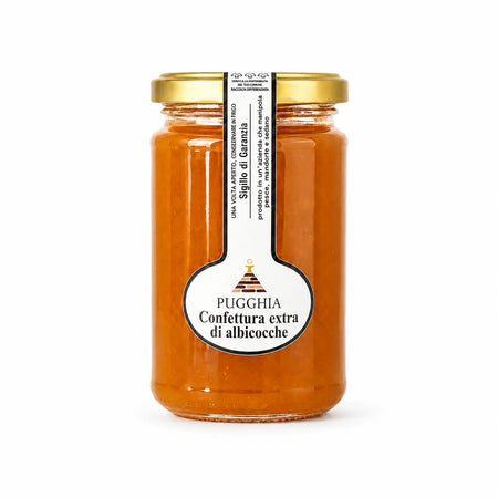 Barattolo di vetro con coperchio dorato e etichetta bianca contenente confettura extra di albicocche ambrate 300 gr