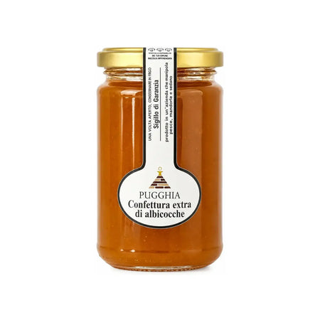 Un barattolo di vetro con confettura extra di albicocche pugghia ambrata sigillato con tappo dorato da 300 gr