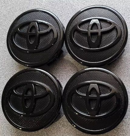 Set 4 Tappi Coprimozzo Cerchi In Lega 57mm Toyota Nero Corolla Yaris Touring Prius Camry Verso