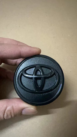 Set 4 Tappi Coprimozzo Cerchi In Lega 57mm Toyota Nero Corolla Yaris Touring Prius Camry Verso