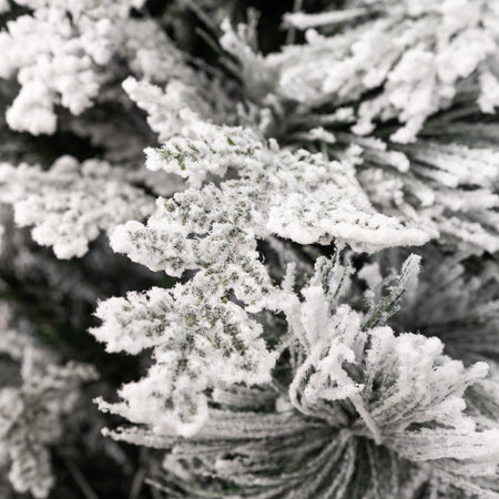 Albero di natale innevato con Pigne "Crans Montana" in  PE Effetto Real Touch + PP Effetto Aghi di Pino
