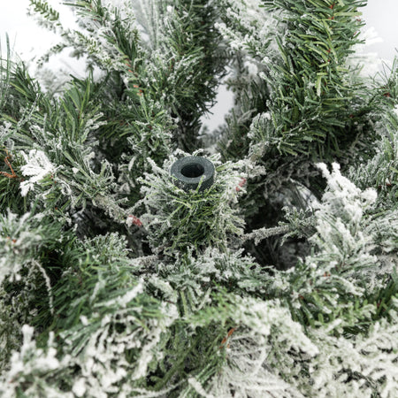 Albero di natale innevato con Pigne "Crans Montana" in  PE Effetto Real Touch + PP Effetto Aghi di Pino