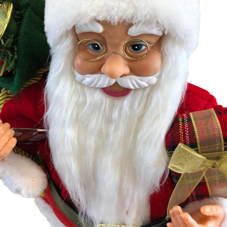Babbo natale decorazione natalizia pupazzo con vestiti rossi tradizionali