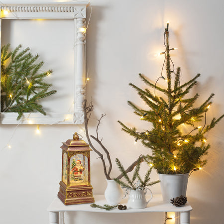 Lanterna natalizia a batteria rosso antico con nevicata glitter h 20 cm