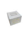 Candela profumata in vetro ambra con forma a fiore, firmata Special Gifts, altezza 6 cm, diametro 8 cm, completa di scatola regalo elegante.