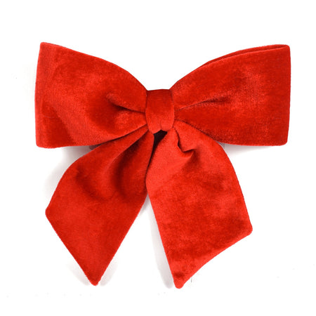 Fiocco rosso in velluto imbottito decorazione natalizia per albero e ghirlanda dietro porta