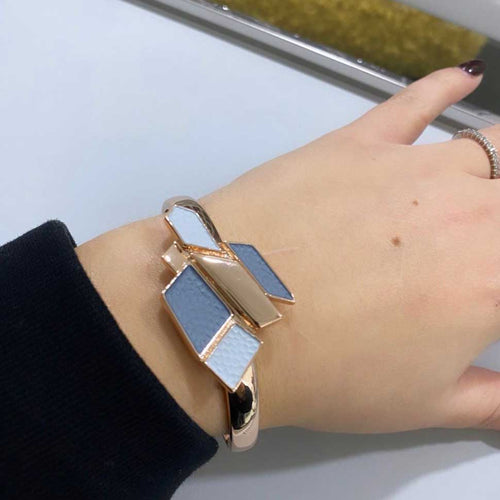 Bracciale artigianale Orbital Corallo Alexarte con cristalli, resine e placcature in oro o argento, confezione elegante inclusa