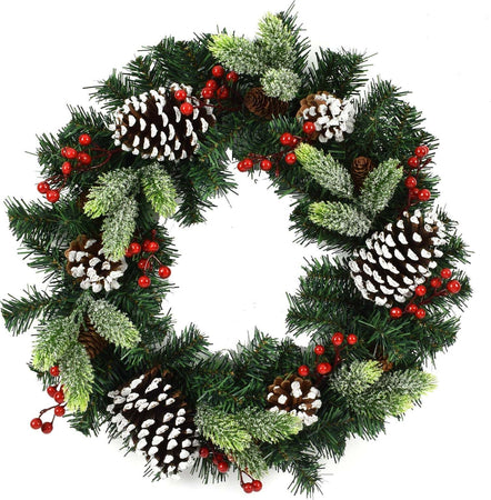Ghirlanda tonda innevata corona dietro porta con bacche e pigne Ø 56 cm﻿ Casa e cucina/Decorazioni per interni/Addobbi e decorazioni per ricorrenze/Decorazioni natalizie/Orpelli e festoni MagiediNatale.it - Altamura, Commerciovirtuoso.it