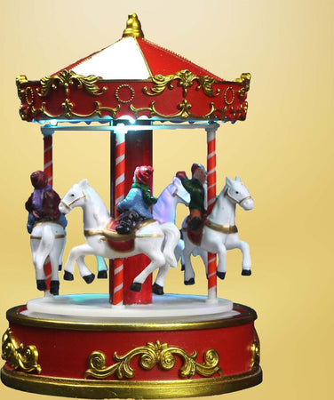 Giostra per villaggio di natale carosello con bambini su cavallo e musiche h 22 cm Casa e cucina/Decorazioni per interni/Addobbi e decorazioni per ricorrenze/Decorazioni natalizie/Oggettistica MagiediNatale.it - Altamura, Commerciovirtuoso.it