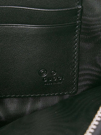 Gucci-Borsa-a-Mano-Pouch-Nera-Uomo-Microguccissima-Mod.-544477-BMJ1N-1000-da-uomo