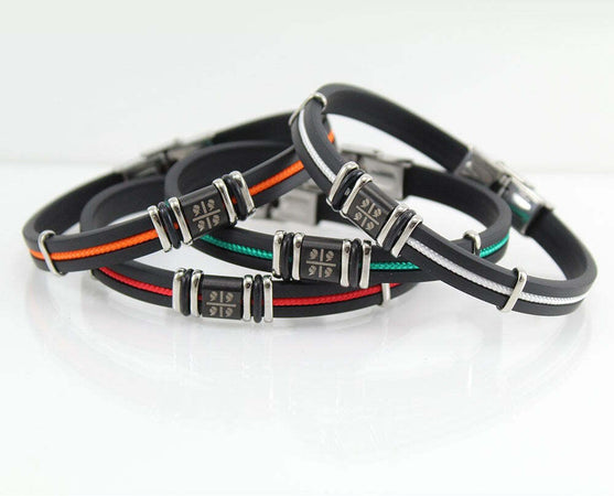 I Giampini bracciale gomma e acciaio con quattro mori incisi e cordino bianco