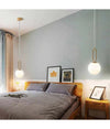Lampadario A Sospensione Minimalista Ovale Metallo Bronzo Con Sfera Vetro G9 A96