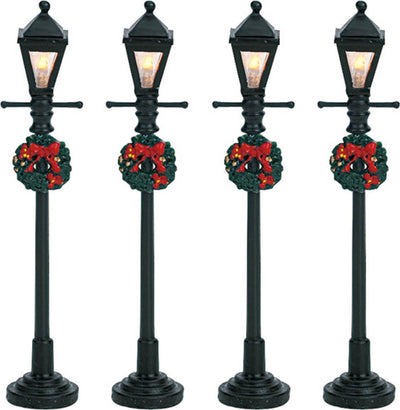 Lampioni illuminati da strada per Villaggio di Natale, set da 4 pezzi, in plastica da 10,5 cm Casa e cucina/Decorazioni per interni/Addobbi e decorazioni per ricorrenze/Decorazioni natalizie/Oggettistica MagiediNatale.it - Altamura, Commerciovirtuoso.it