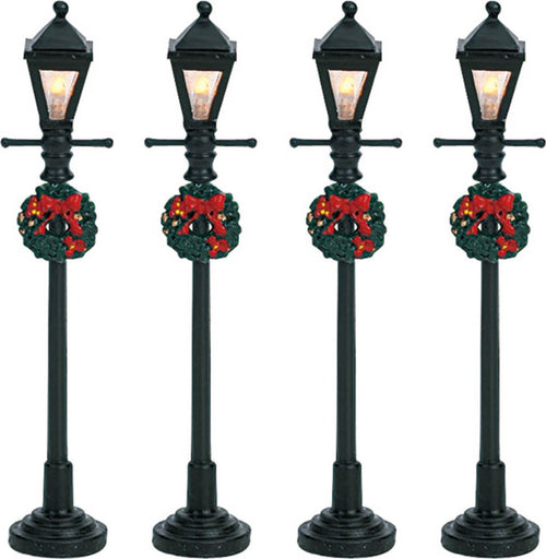 Lampioni illuminati da strada per Villaggio di Natale, set da 4 pezzi, in plastica da 10,5 cm Casa e cucina/Decorazioni per interni/Addobbi e decorazioni per ricorrenze/Decorazioni natalizie/Oggettistica MagiediNatale.it - Altamura, Commerciovirtuoso.it