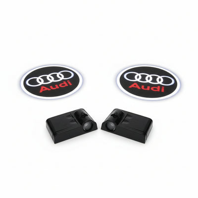 KIT LUCI LED LOGO AUDI PROIETTORE CORTESIA BATTERIA CON SENSORE MAGNETE