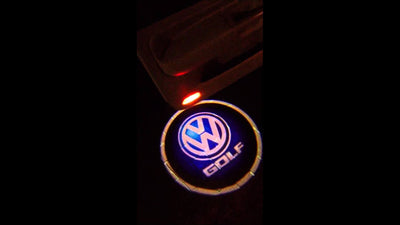 KIT LUCI CORTESIA LOGO LED PROIETTORE VOLKSWAGEN GOLF A BATTERIA CON SENSORE MAGNETE
