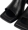 MARINE-SERRE-Mules-in-pelle-goffrata-in-nero-da-donna