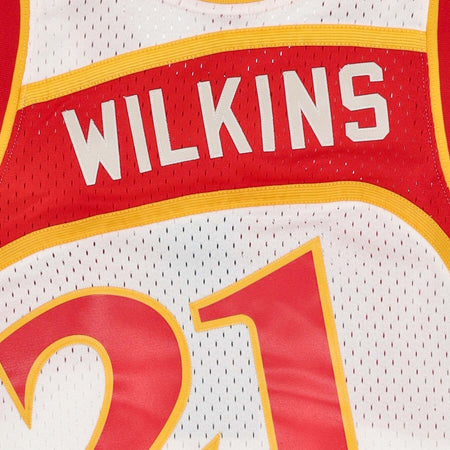 MITCHELL-&amp;-NESS-Canotta-Basket-Uomo-Nba-Off-White-Team-Color-Swingman-Jersey-Hardwood-Classics-1986-No-21-Dominique-Wilkins-Atlhaw-Off-White-da-uomo