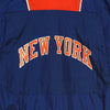 MITCHELL-&-NESS-Giacca-a-Vento-Infilabile-Uomo-Nba-Highlight-Reel-Windbreaker-Hardwood-Classics-Neykni-Original-Team-Colors-da-uomo
