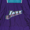 MITCHELL-&-NESS-Giacca-a-Vento-Infilabile-Uomo-Nba-Highlight-Reel-Windbreaker-Hardwood-Classics-Utajaz-Original-Team-Colors-da-uomo
