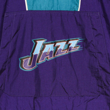 MITCHELL-&amp;-NESS-Giacca-a-Vento-Infilabile-Uomo-Nba-Highlight-Reel-Windbreaker-Hardwood-Classics-Utajaz-Original-Team-Colors-da-uomo