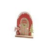 Porta natalizia in legno con decorazioni natalizie