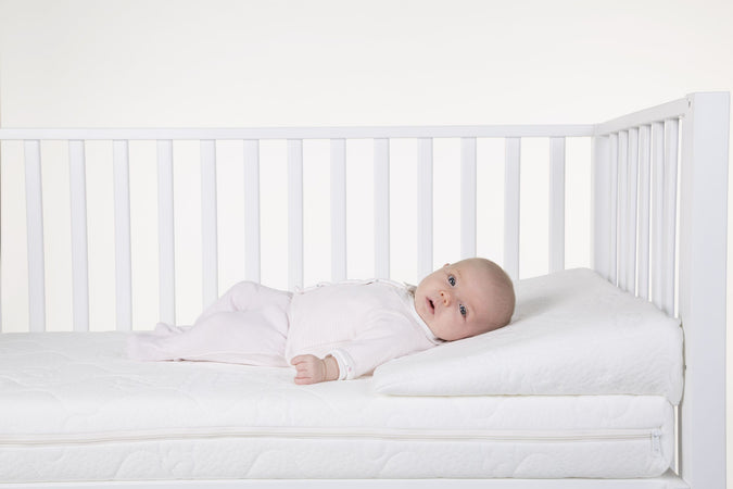 Rialzo Materasso Childhome Heavenly Reflux per Lettino 70x140 cm