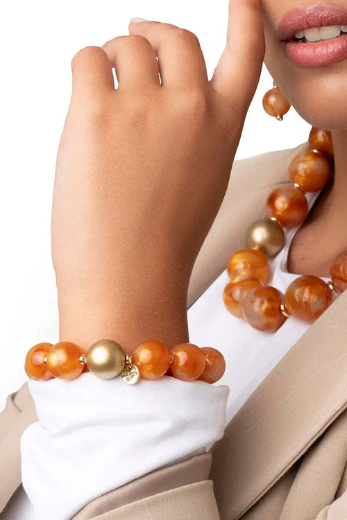 MYA-ACCESSORIES-|-Bracciale-elastico-con-sfere-dalle-nuances-arancio