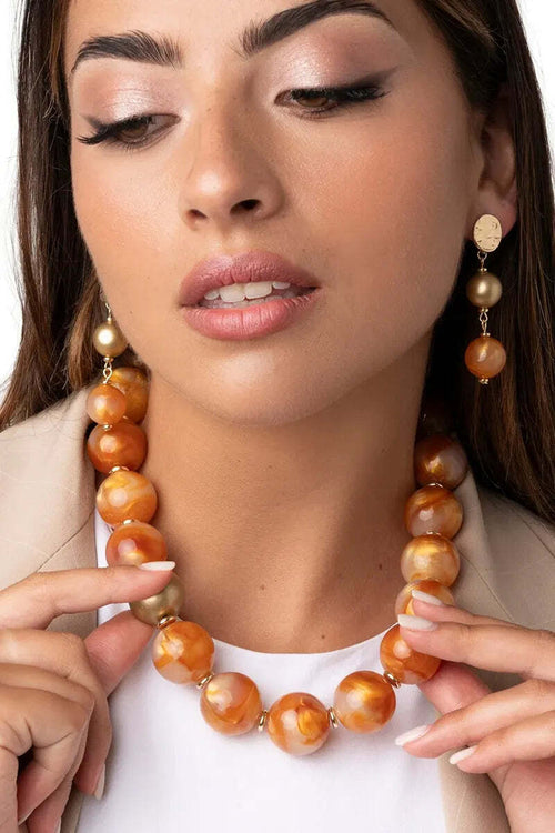 MYA-ACCESSORIES-|-Collana-girocollo-con-sfere-dalle-nuances-arancio