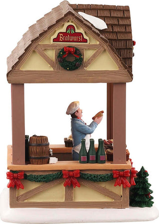 Negozio di BratWurst con luci edificio in poliresina per villaggio di Natale Casa e cucina/Decorazioni per interni/Addobbi e decorazioni per ricorrenze/Decorazioni natalizie/Oggettistica MagiediNatale.it - Altamura, Commerciovirtuoso.it