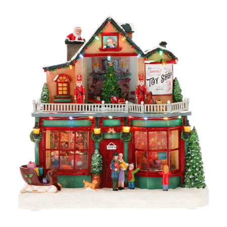 Scena Natalizia negozio giochi illuminata con led decorazione per villaggio di Natale