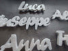 NOMI SEGNAPOSTO COMUNIONE BATTESIMO MATRIMONIO CALAMITA PLEXIGLA REGALO BOMBONIERE
