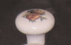ORECA---1-POMOLO-TONDO-IN-PORCELLANA-BIANCO-MOTIVO-UVA-30X25mm